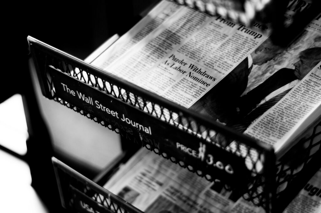 Decorative image of a stack of newspapers